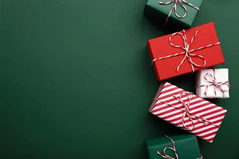 Gift boxes on color background, flat lay, space for text Stock Photos