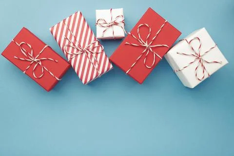 Gift boxes on color background, flat lay, space for text Stock Photos
