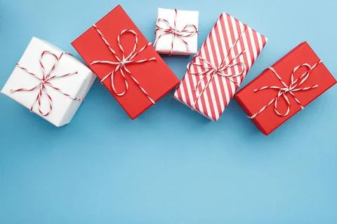 Gift boxes on color background, flat lay, space for text Stock Photos