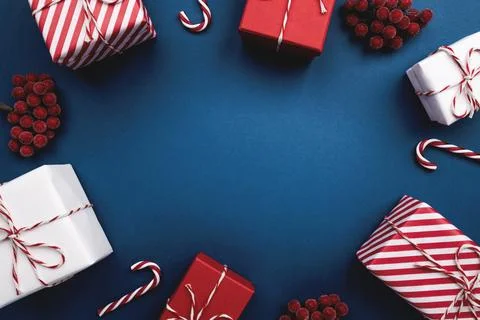 Gift boxes on color background, flat lay, space for text Stock Photos