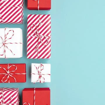 Gift boxes on color background, flat lay, space for text Stock Photos