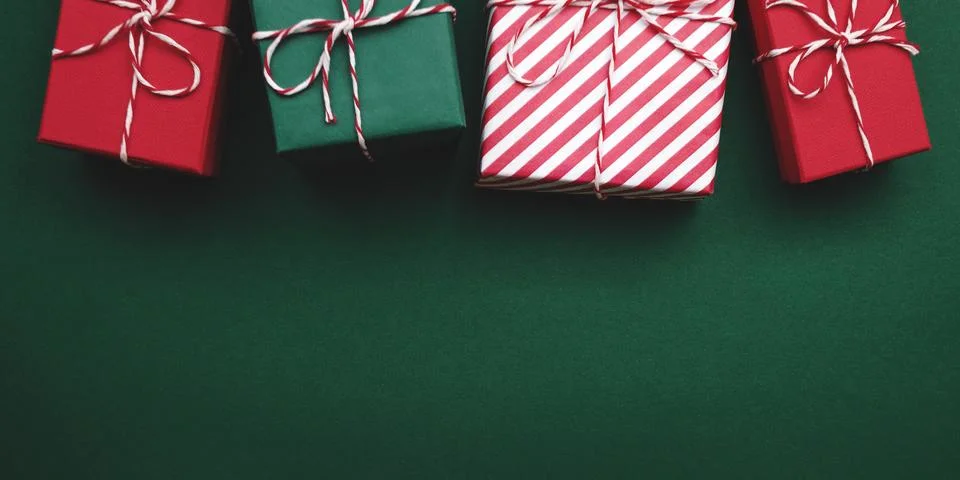 Gift boxes on color background, flat lay, space for text Stock Photos