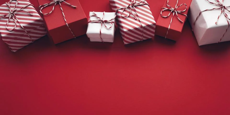 Gift boxes on color background, flat lay, space for text Stock Photos