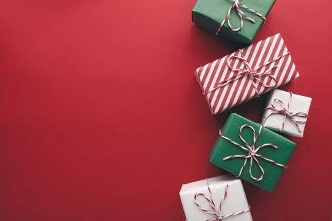 Gift boxes on color background, flat lay, space for text Stock Photos