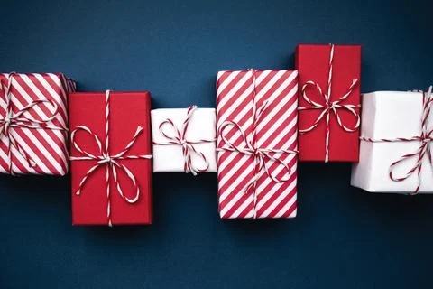 Gift boxes on color background, flat lay, space for text Stock Photos