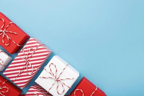 Gift boxes on color background, flat lay, space for text Stock Photos