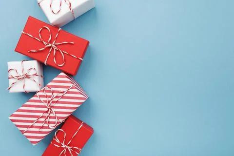 Gift boxes on color background, flat lay, space for text Stock Photos