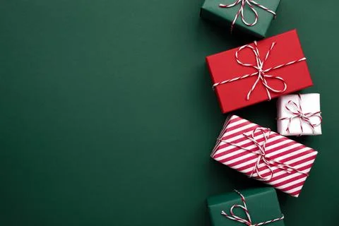 Gift boxes on color background, flat lay, space for text Stock Photos