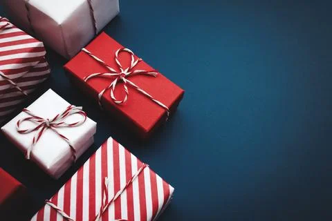 Gift boxes on color background, flat lay, space for text Stock Photos