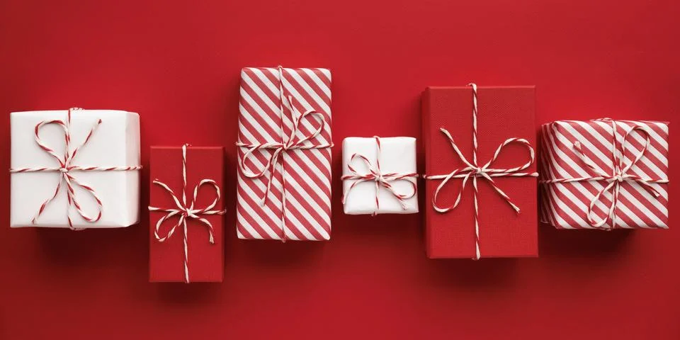 Gift boxes on color background, flat lay, space for text Stock Photos