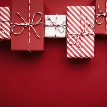 Gift boxes on color background, flat lay, space for text Stock Photos