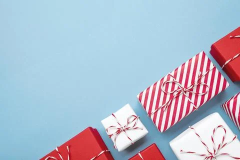 Gift boxes on color background, flat lay, space for text Stock Photos