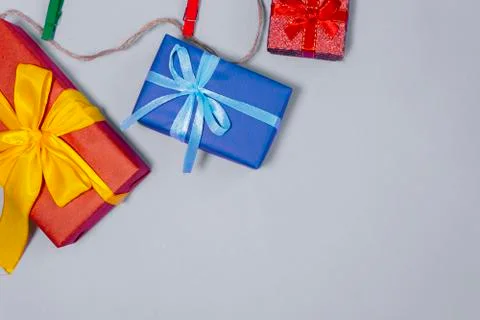 Gift Boxes on colourful background. New Year's flatlay. Birthday concept. Stock Photos