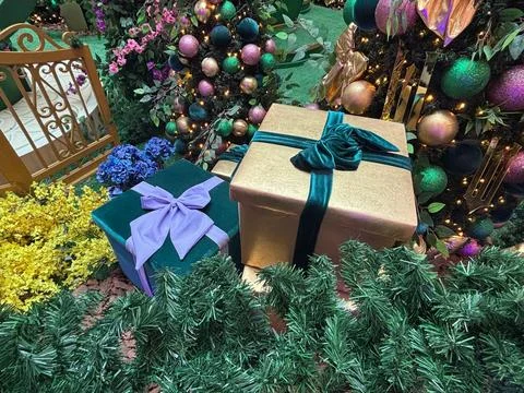 Gift boxes decorated with flowers Stock Photos