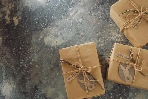 Gift boxes decorated with a willow branch. Stock Photos