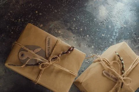 Gift boxes decorated with a willow branch. Stock Photos