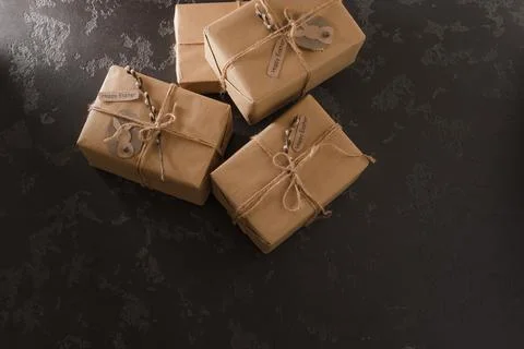 Gift boxes decorated with a willow branch. Stock Photos