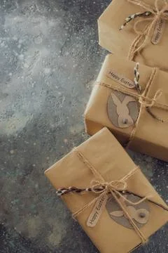 Gift boxes decorated with a willow branch. Stock Photos