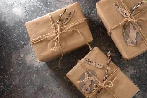 Gift boxes decorated with a willow branch. Stock Photos