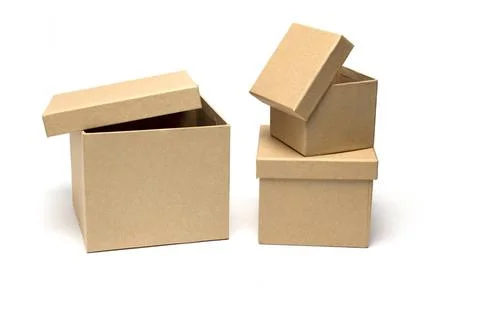 Gift boxes different size stacked white background Close up of three cardb... Foto stock