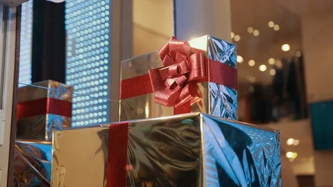 Gift Boxes Of Gold Color With Red Ribbon Are Waiting For Owner, Packed Surprise Stock Footage 129489252