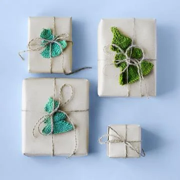 Gift boxes in gray craft paper Stock Photos