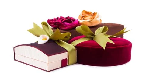Gift boxes with a green bow on white background Stock Photos