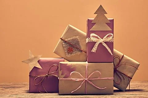 Gift boxes handcraft stack. New Year 2016 on wood Stock Photos