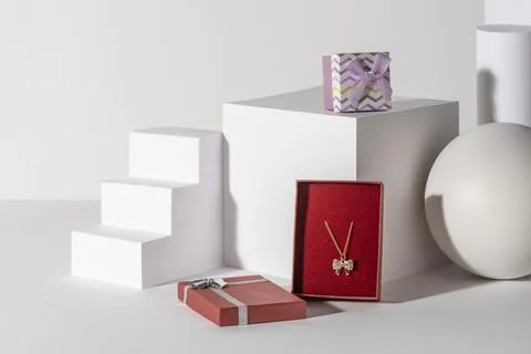Gift boxes with jewelry presented on 3d paper shapes Stock Illustration