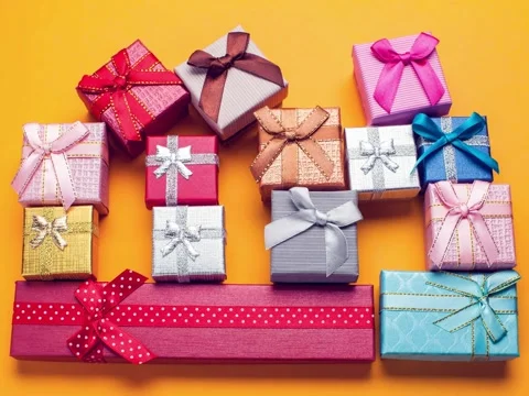 Gift Boxes moving on the table Stock Footage 140781050