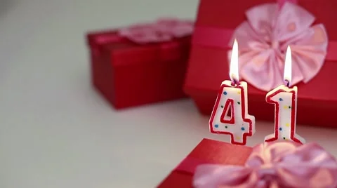 Gift boxes with number candles (41)  Stock Footage 8621708