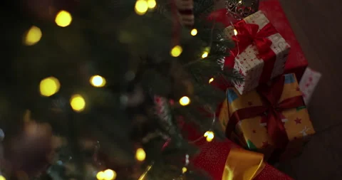 Gift boxes under fir-tree. The celebration of New Year. Xmas concept. Stock Footage 221477217