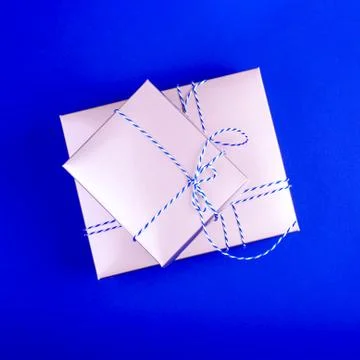 Gift boxes with white-blue threads Stock Photos