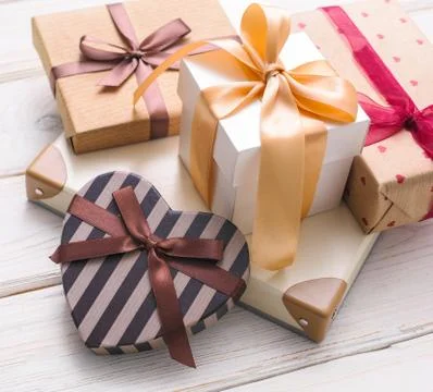 Gift boxes on white wooden table 写真素材