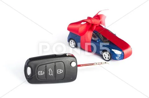 Gift car concept with red bow Stock Photos