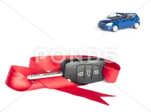 Gift car concept with red bow Stock Photos