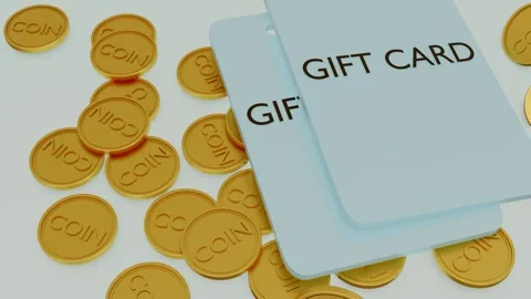 Gift card and falling gold coin on the white background Stock Footage 259011169