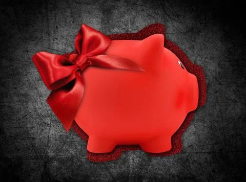 Gift card label in the shape of a red piggy bank with red glitter ribbon bow  Stock Photos