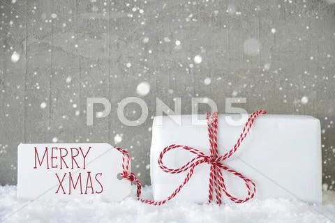 Gift, Cement Background With Snowflakes, Text Merry Xmas Stock Photos
