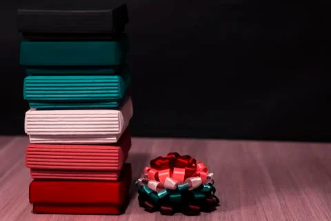 Gift composition. Boxes of different colors on the left. On the right is a Фото