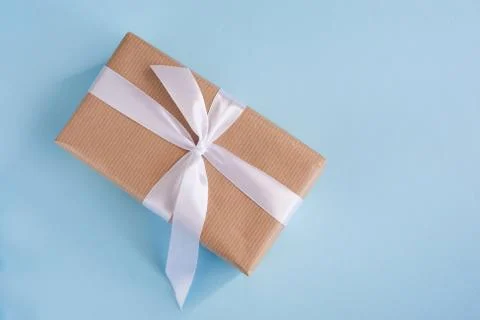 Gift in a craft package  Stock Photos