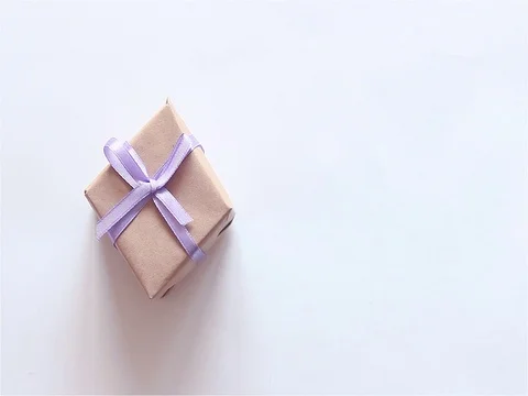 A gift of craft paper on a white background Stock Footage 110851216