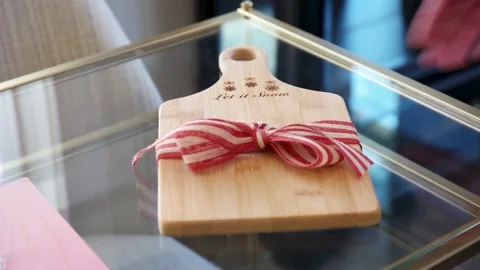 Gift cutting board on the glass table Stock Footage 132004840