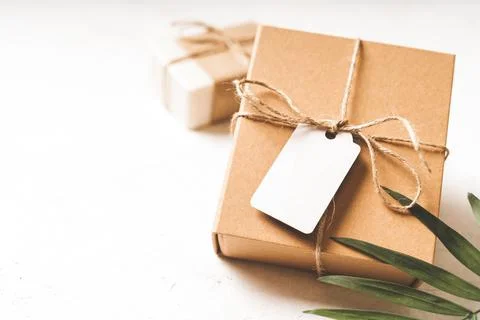 Gift with empty mockup tag Stock Photos