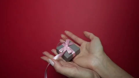 Gift in female hands. Stock Footage 146167511