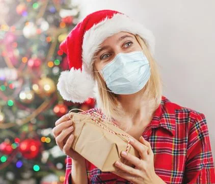 Gift on female hands Stock Photos