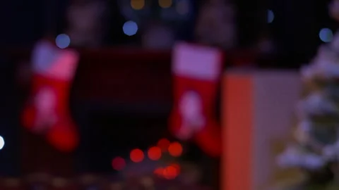 Gift of Joy: Focus Pull into Christmas Presents and Xmas Socks Stock-Footage 241047812