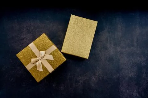 Gift packages on dark background Stock Photos