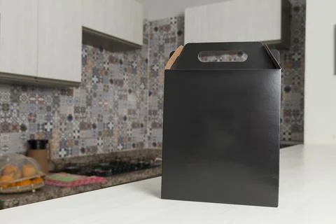 Gift packaging on the wooden table with space for advertising and copy space. Fotos Stock