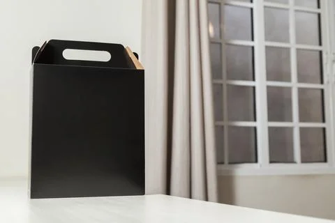 Gift packaging on the wooden table with space for advertising and copy space. Foto stock